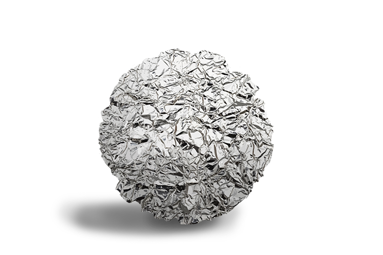 The first step in the process is to form a ball by scrunching up large amounts of aluminium foil.