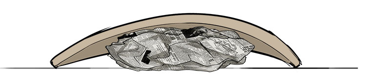 Below is a cross-section of the mask after it has been shaped over the newspaper