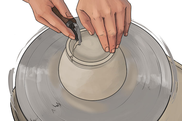 Remove the material from the centre of the channel. When removing this material you are aiming for a curved surface that matches the curve on the inside of the bowl as seen in the image below