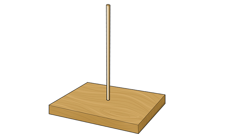 Cut your dowel to 20cm in length and tap it into the hole.