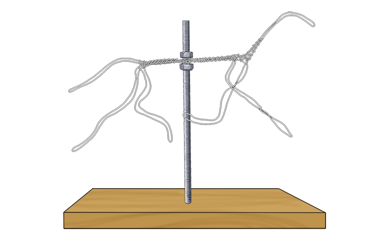 Now your armature is in the correct shape, place one nut onto the threaded rod, then wire your armature to it, then tighten another nut above it to hold it in place. 