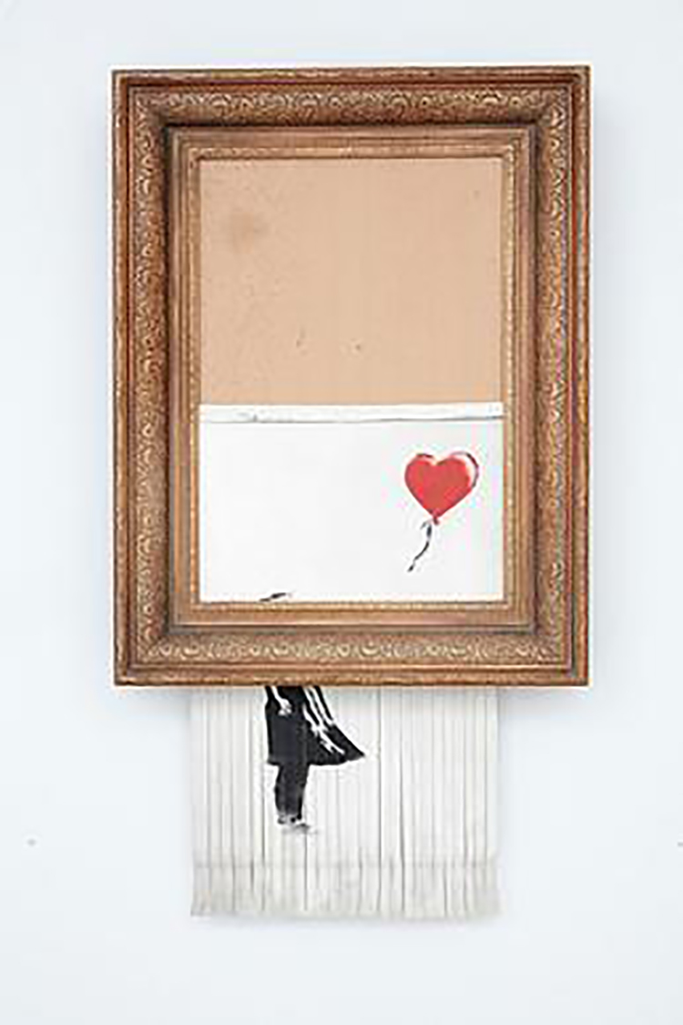 Cropping occurred at an auction of a Banksy painting called "Girl with a Balloon"