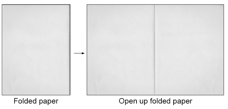 Start by folding your paper in half so you have the middle line and then open it back up and lay it flat.