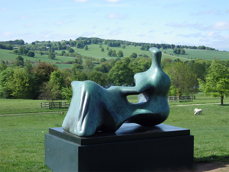 Henry Moore is famous for sculptures of people with smooth, little definition and hollow spaces through their bodies