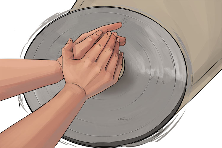 Place the heel of your left hand against the clay with the side your hand in contact with the wheel. Then cup your right hand over the clay. Keeping your hands steady, gently apply pressure to smooth the clay into a dome