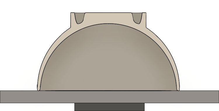Use the rounded edge or 'beak' of the trimming tool to carve a channel into the bottom of the bowl