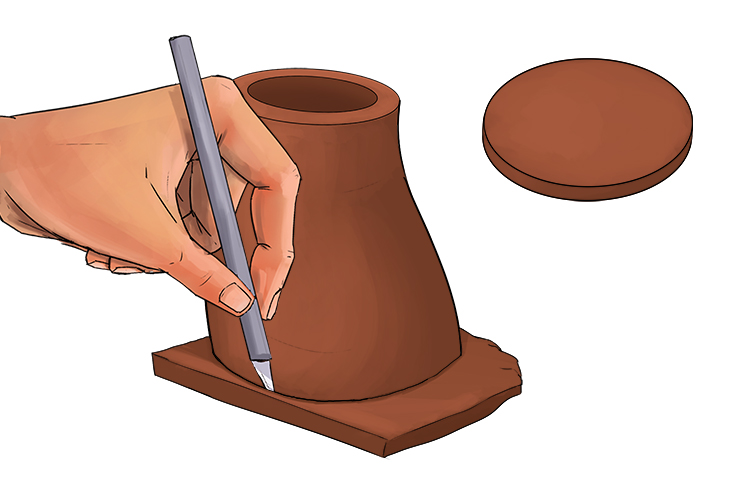 Place your stem on some of your previously rolled out clay and cut around the base of your stem to create a bottom for your plant pot