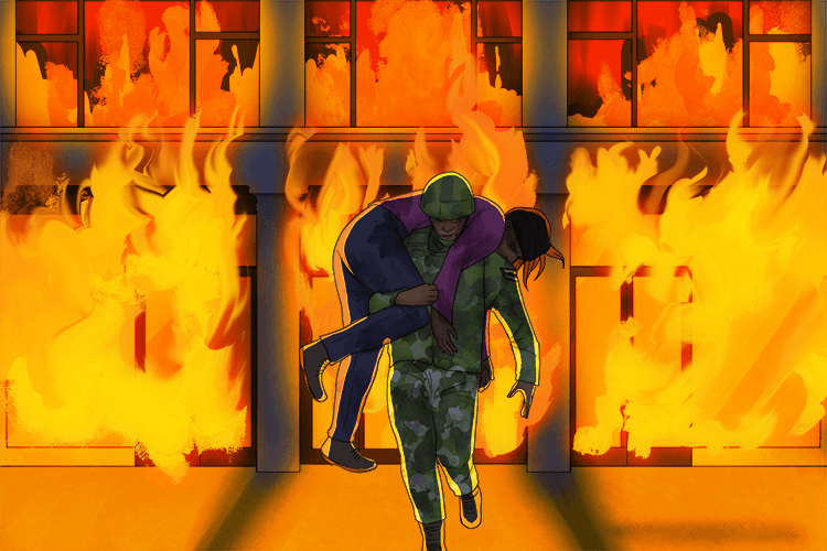 The army corporal was having to carry a body out of the burning building.