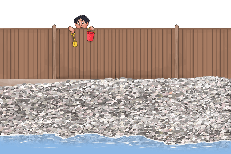 I was excited to play on the beach, but then I saw shingles over the fence (shing-fen) not sand.