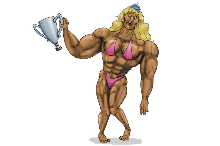 Strong as she is, the World's Strongest Woman looks the worse for wear as she takes (fuerte) the trophy.